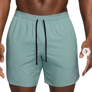 Nike Men’s stride short in teal with drawstrings and deep pockets